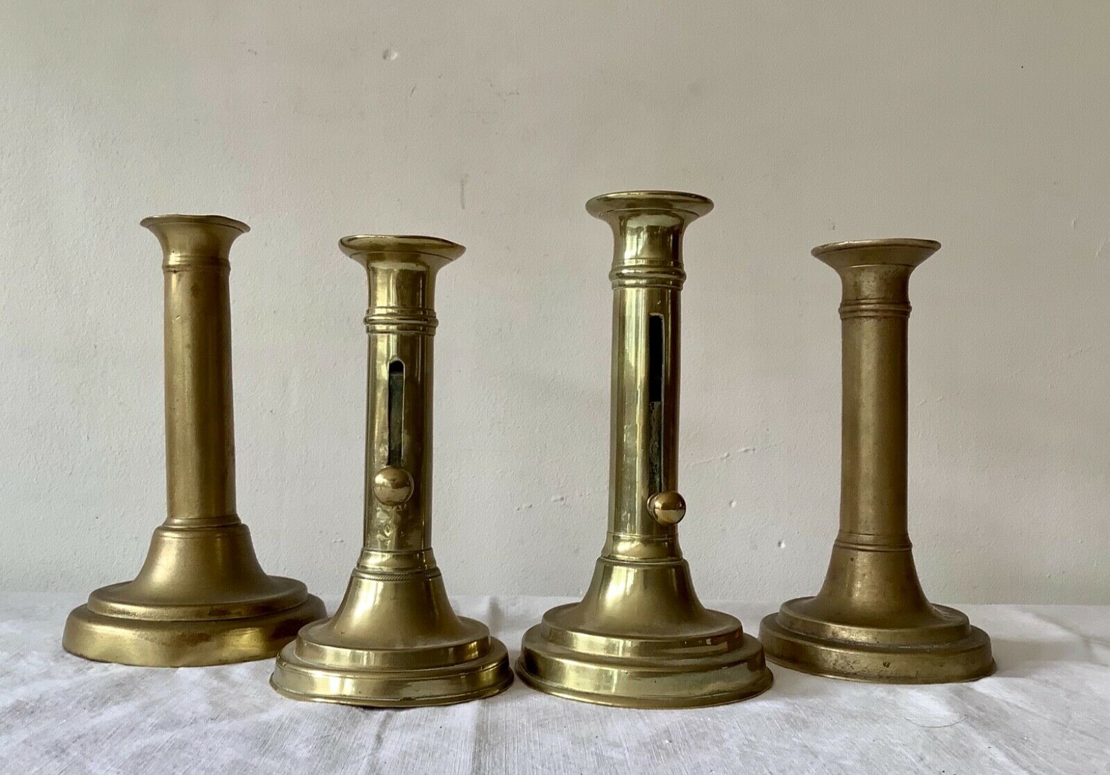 Lot of 4 old candlesticks