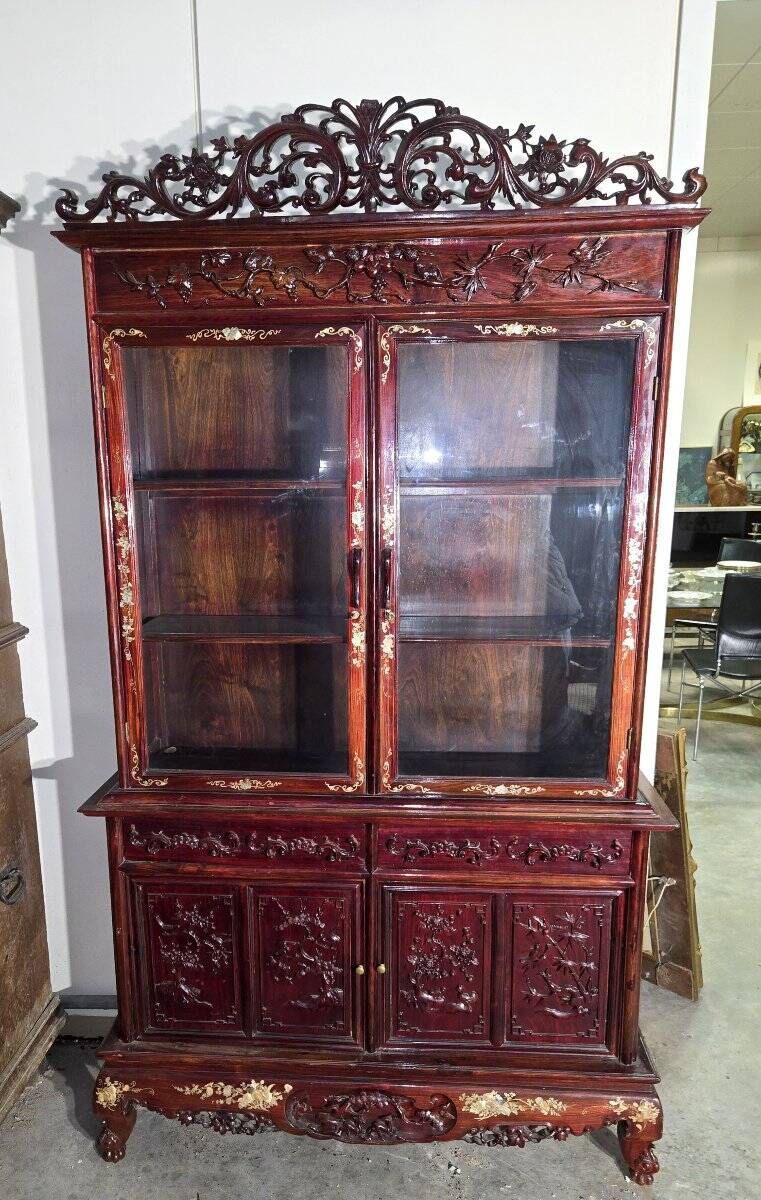 Asia 19th century: Ancient lacquer library, richly carved and decorated.