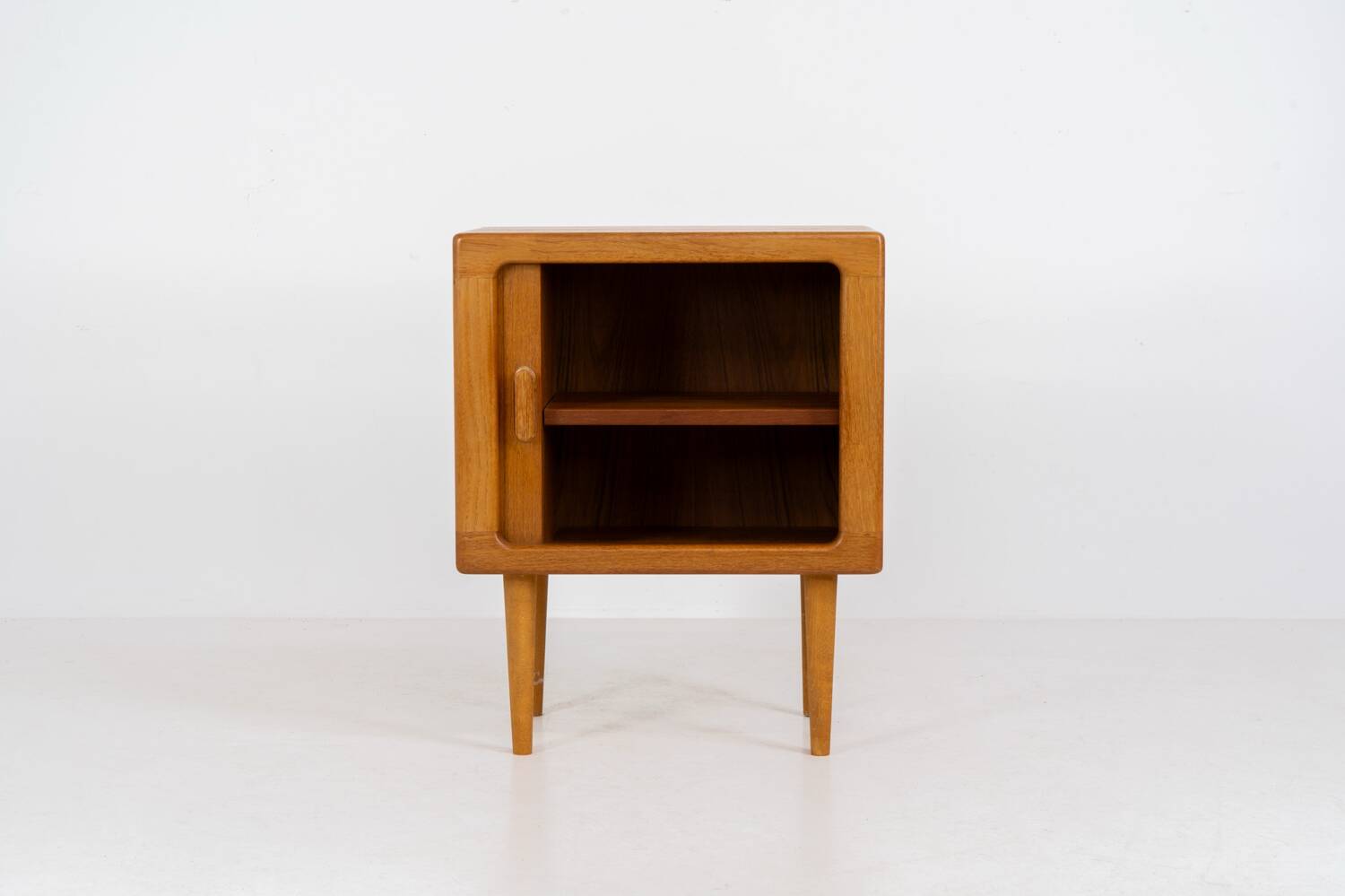 Compact cabinet with tambour door by CFC Silkeborg (Denmark, 1960s).
