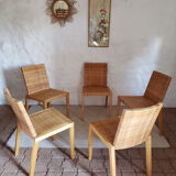 5 wooden and rattan chairs