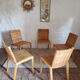 5 wooden and rattan chairs