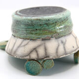 Atypical cup in turquoise and gray raku with signature