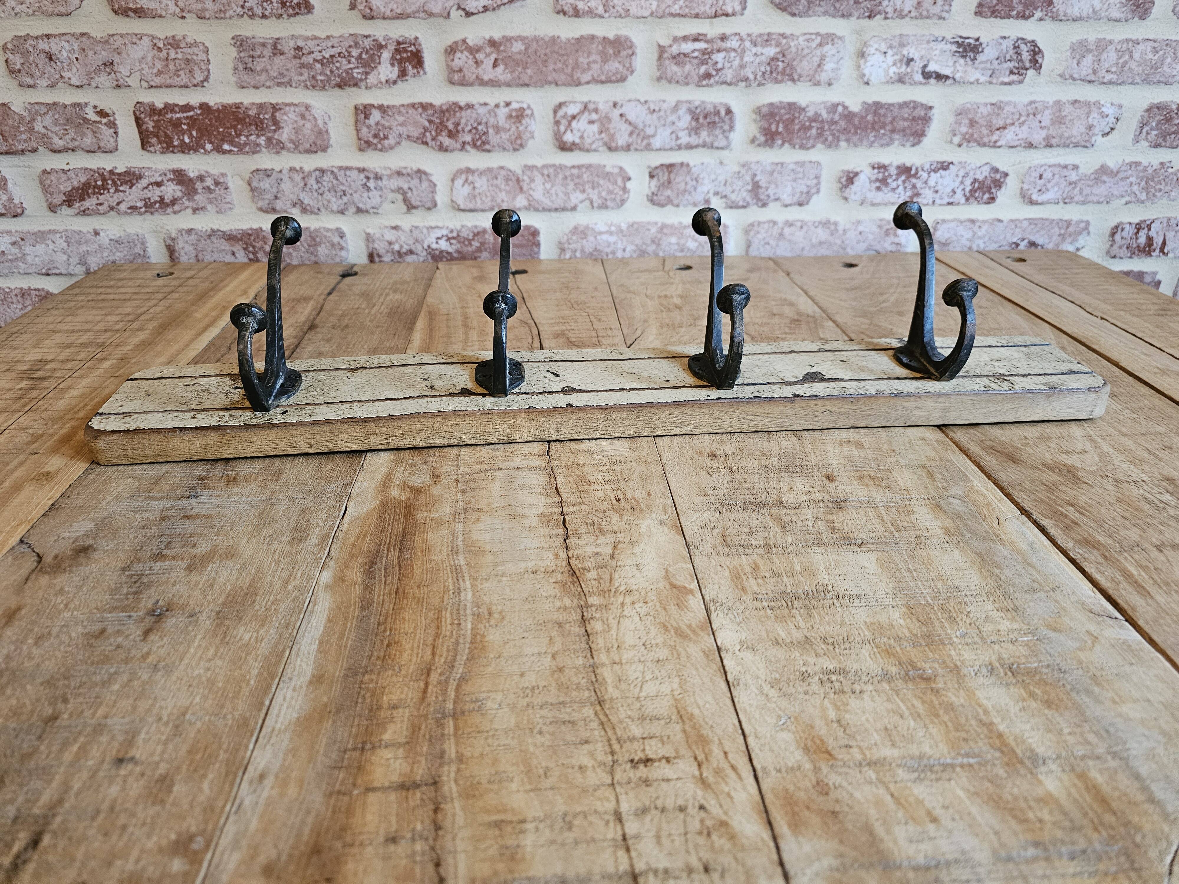 Solid teak coat hook with 4 double cast iron hooks