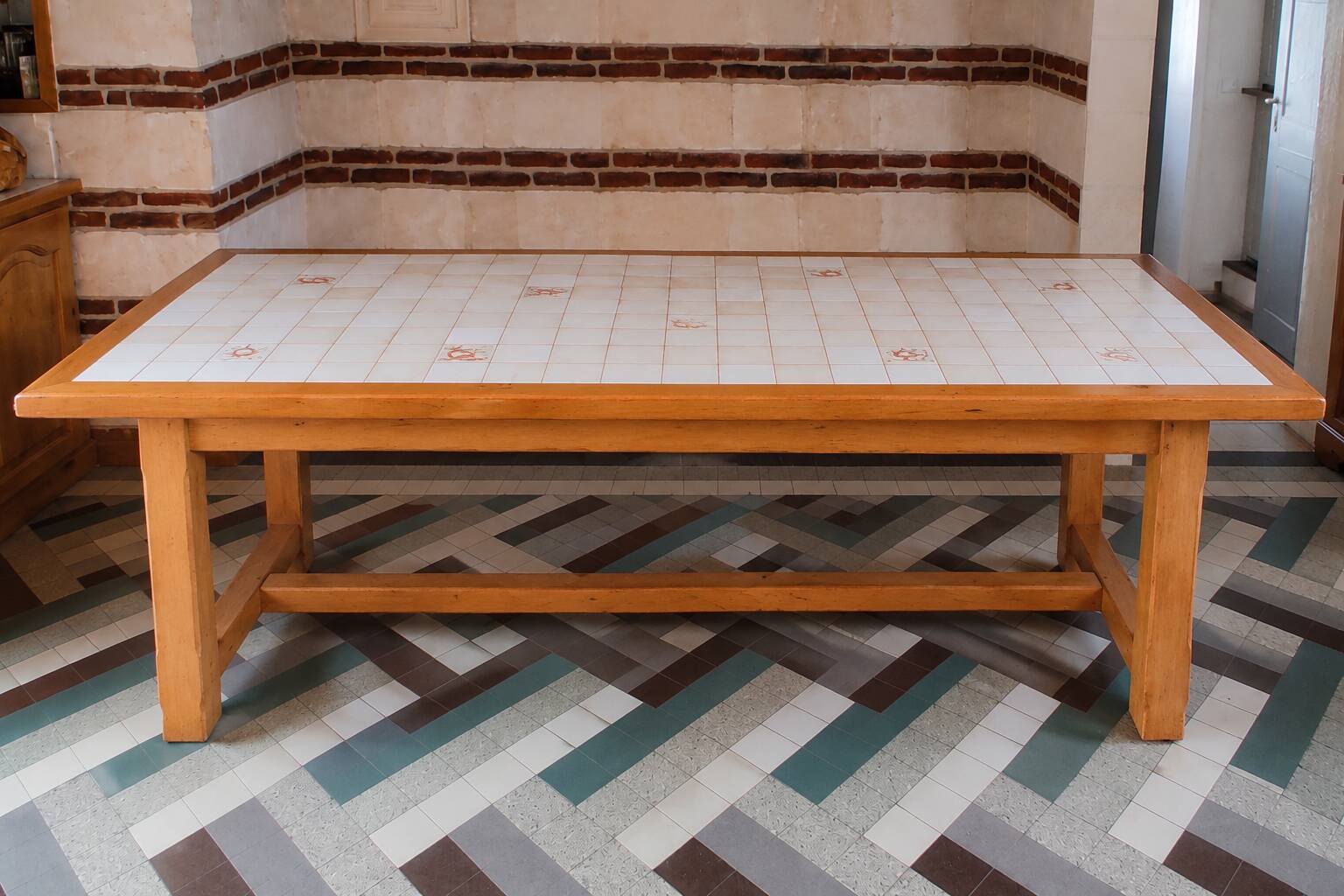 Large solid oak table, tiled top + 4 chairs