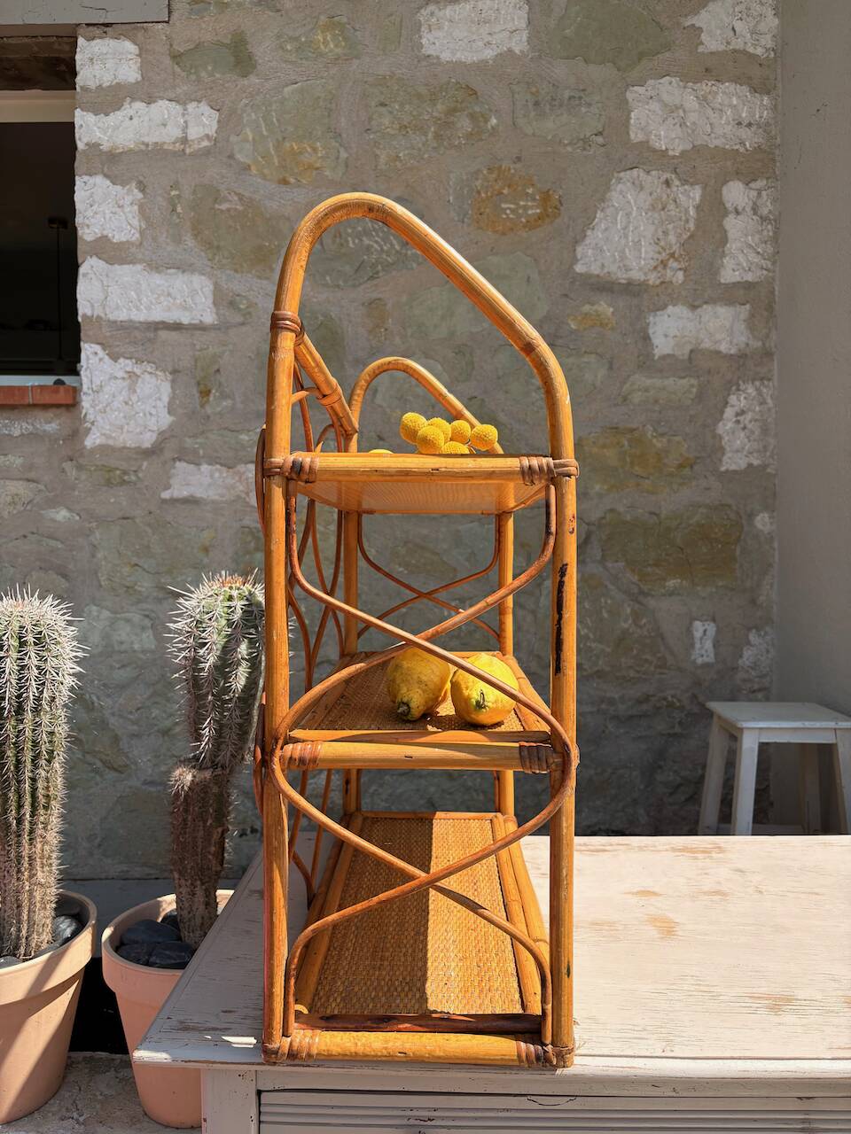 Vintage wall shelf in rattan