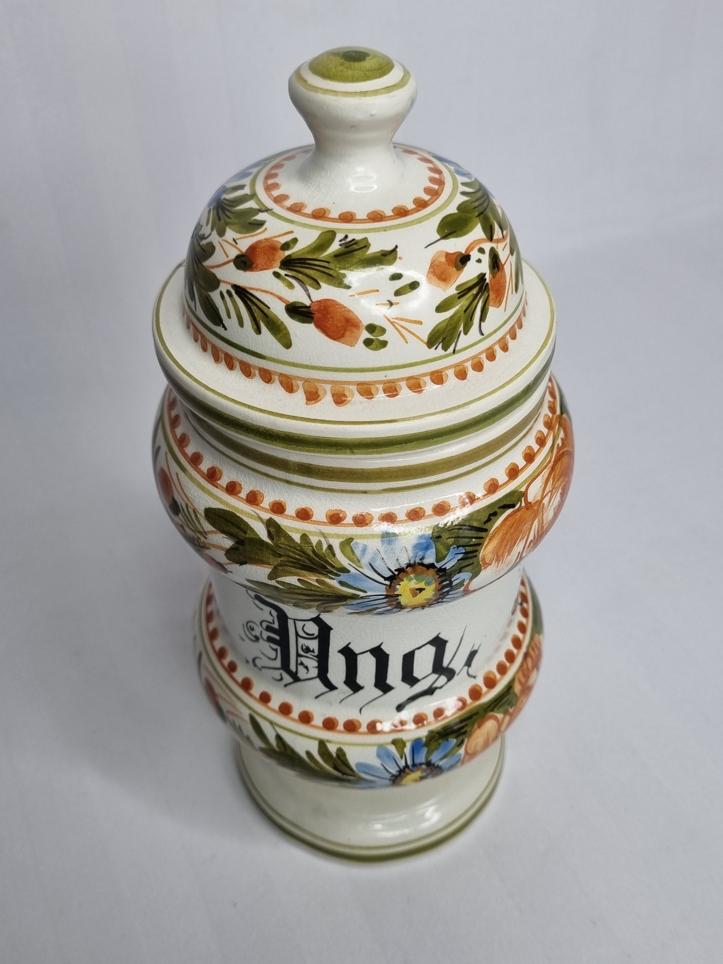 Hand-decorated enamelled ceramic apothecary pot, "Ong. Rasino"