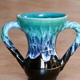 Ancient amphora vase in turquoise glazed stoneware.