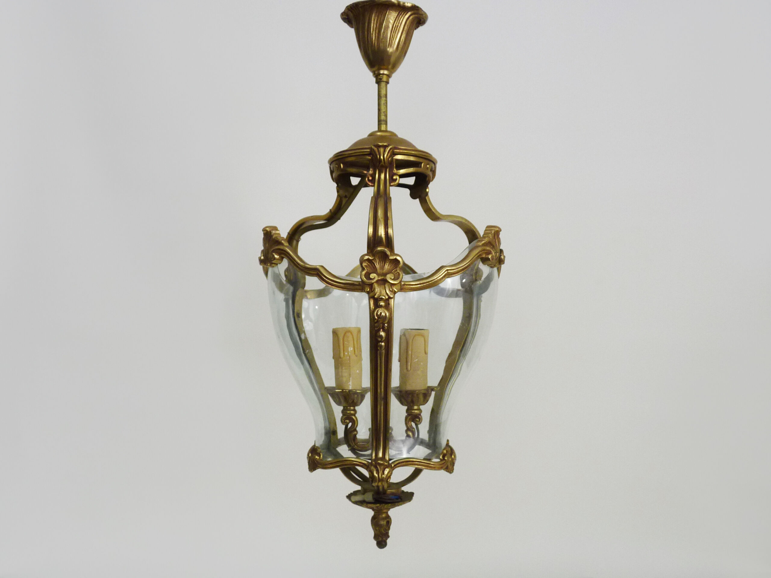 Old lantern with 3 faces, chandelier in gilded bronze and curved glass. Year 60