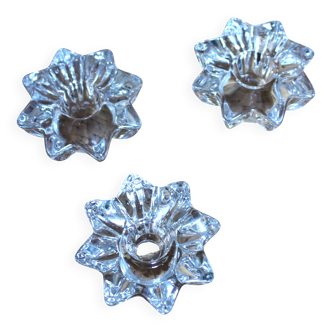 A set of 3 vintage star flower glass candle holders.
