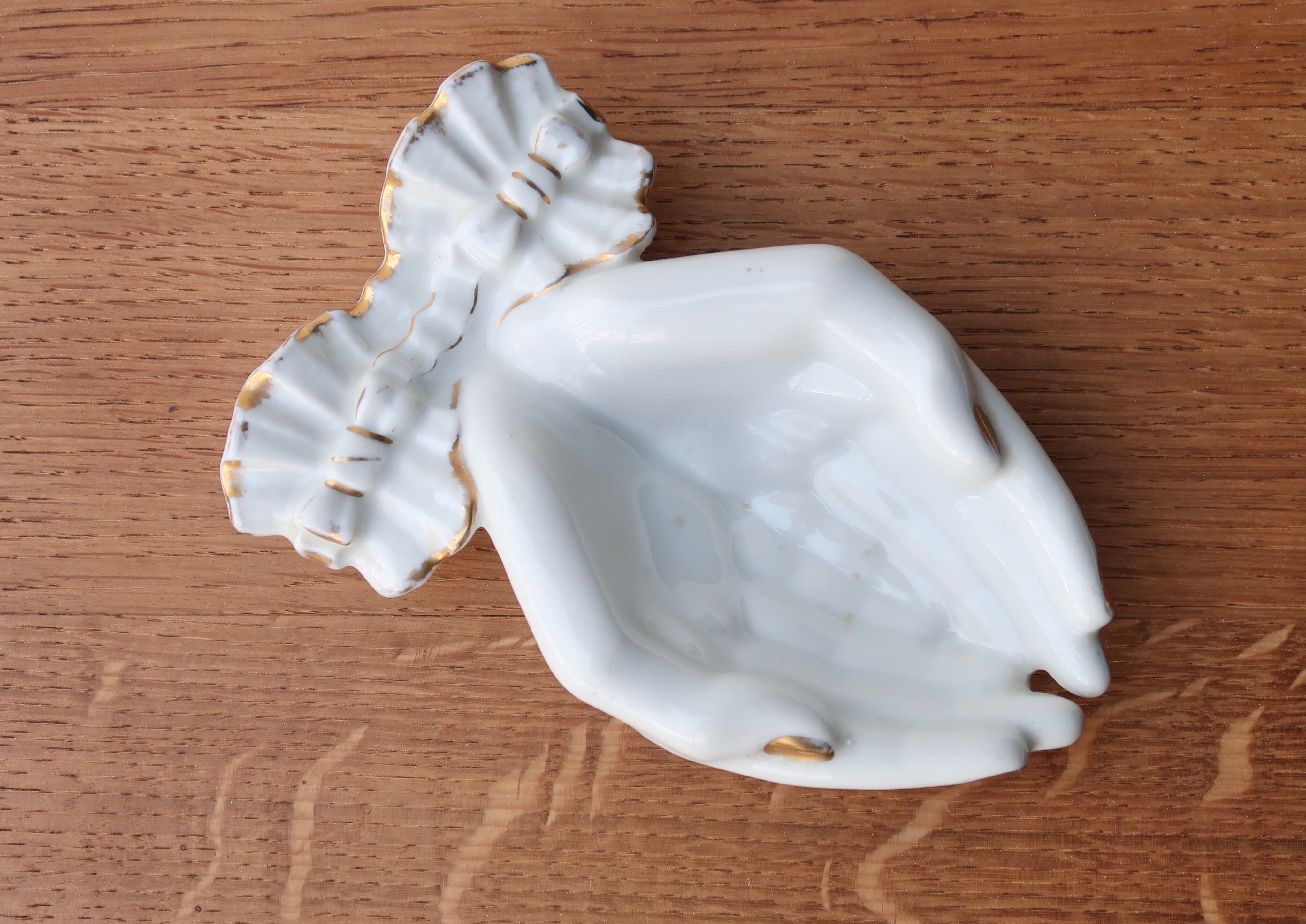 Empty hand pocket in white porcelain, 70s