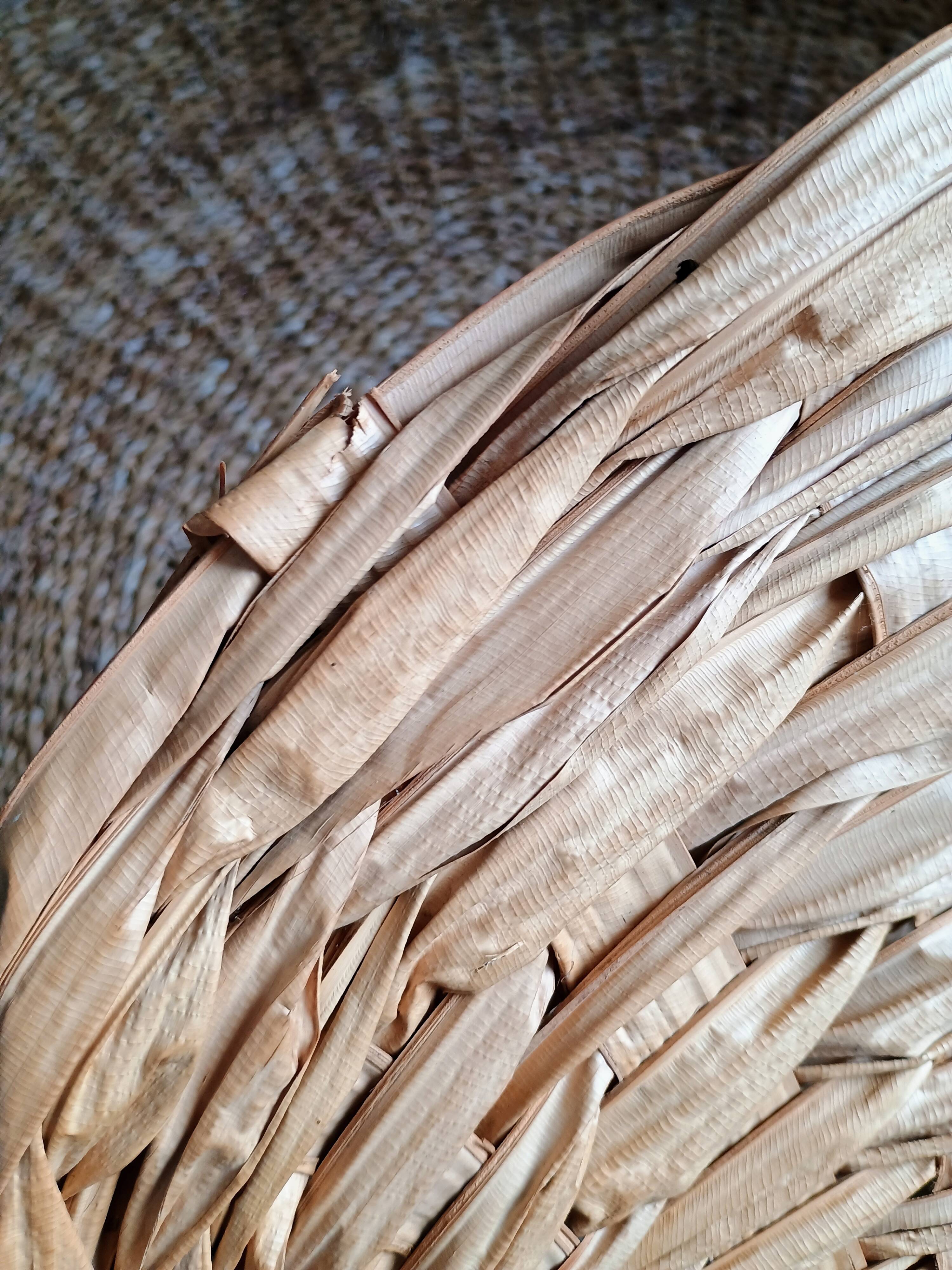 Heart fan in vintage woven palm leaves