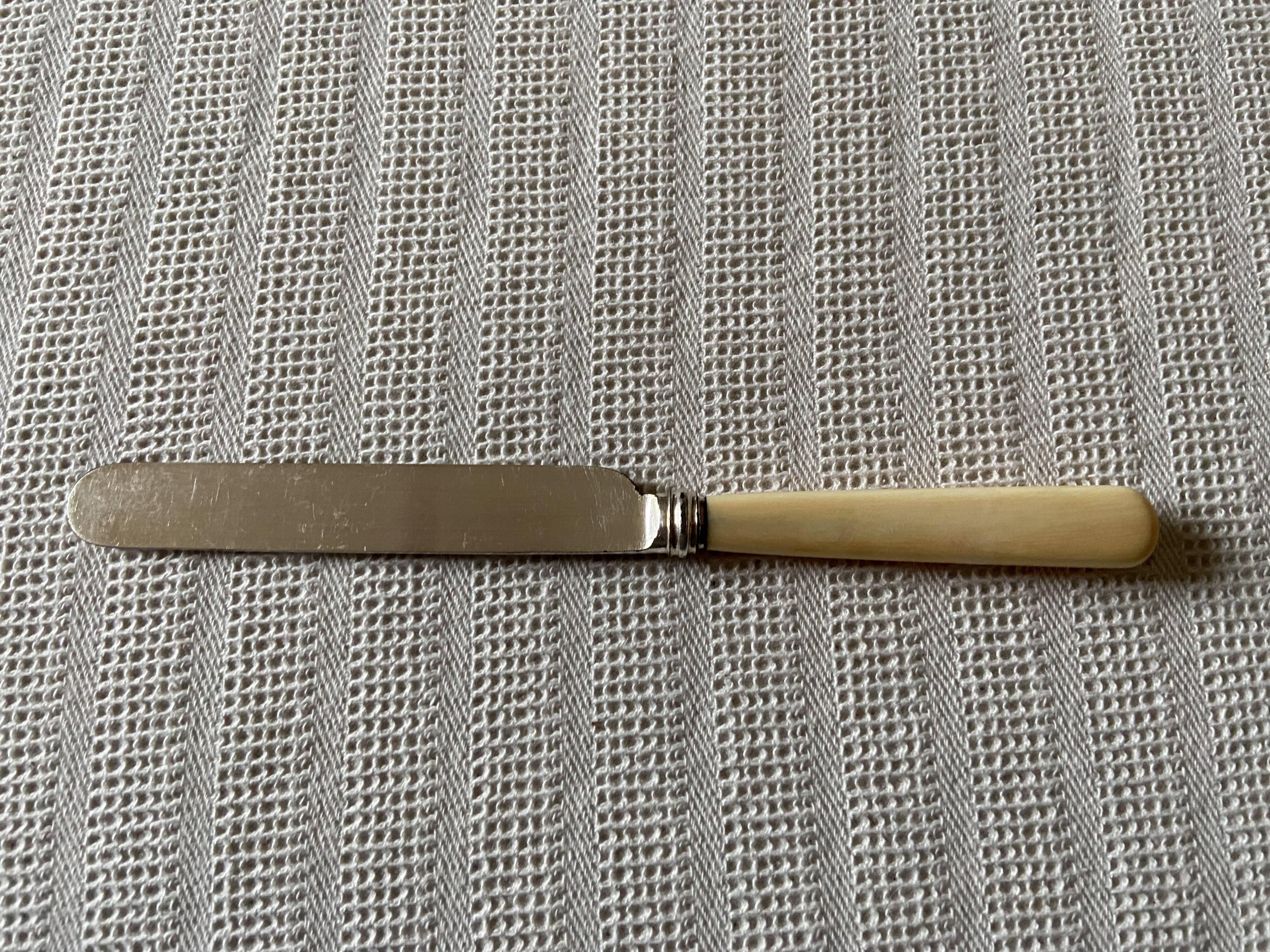 Antique silver-plated butter knife