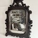 Napoleon III mirror in carved blackened wood, 19th century