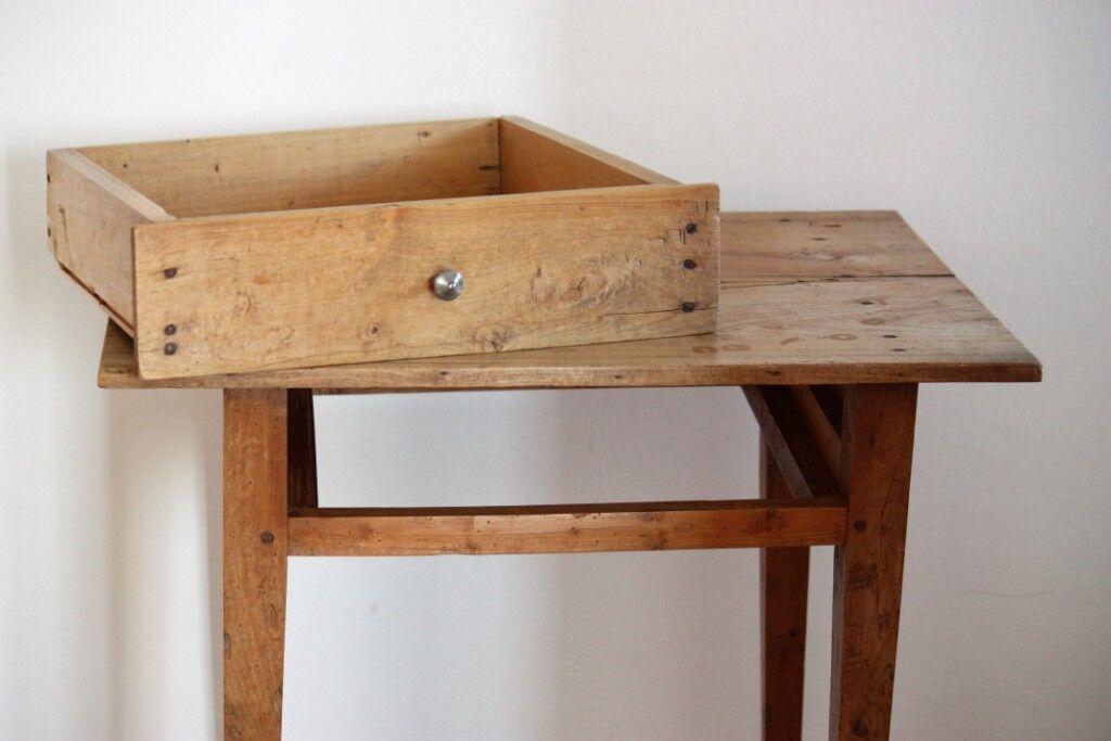 Wooden table with drawer
