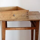 Wooden table with drawer