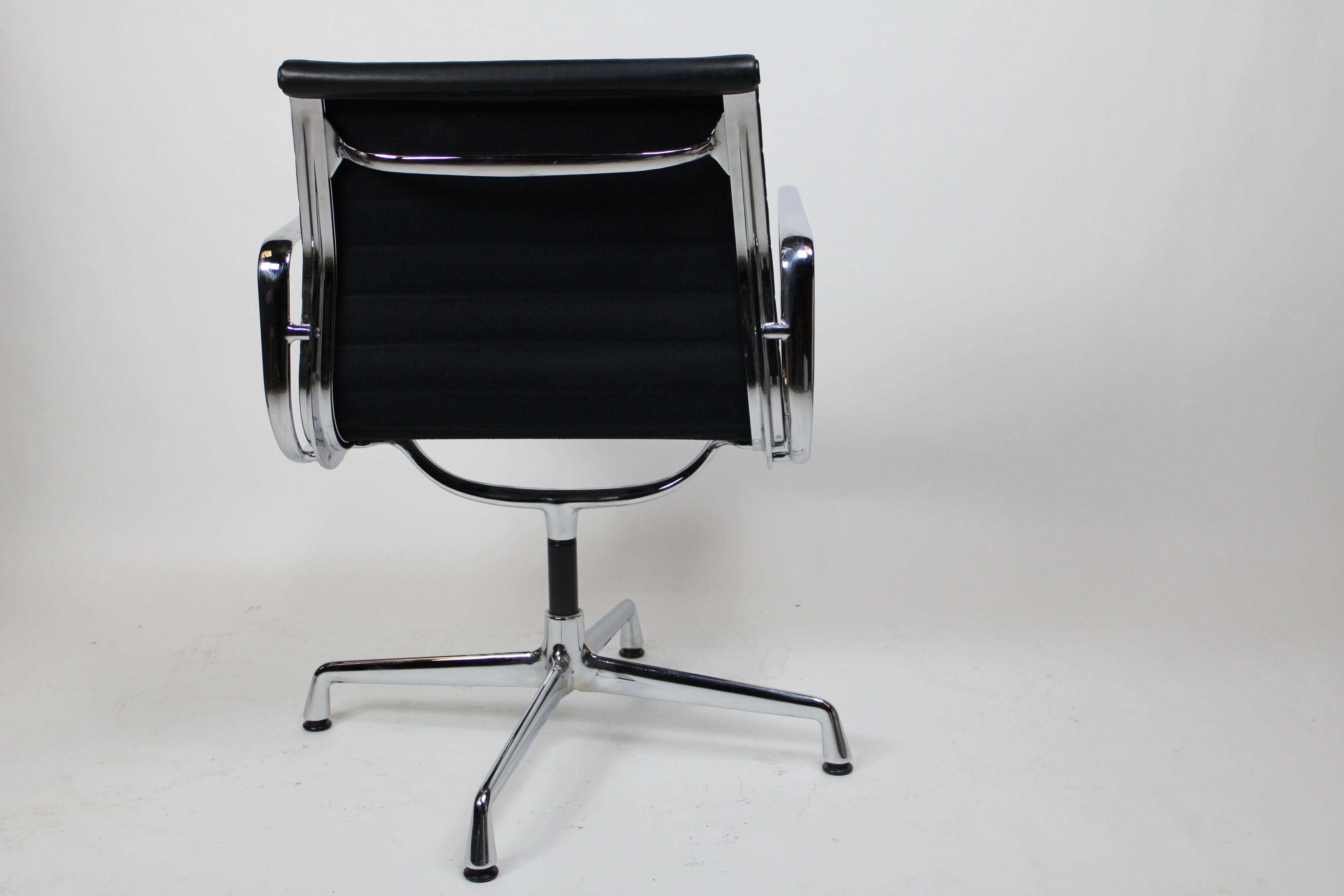 Vintage chair by charles eames ea 108 black leather edition vitra denmark