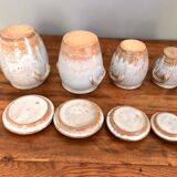 Suite of antique enamelled ceramic pots