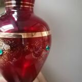 Red vase with gold decoration