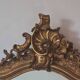 Antique Louis Philippe mirror with a pediment.