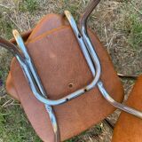 Two Tublac chairs in Skaï and chrome