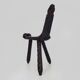 Brutalist tripod chair in raw wood. solid wood chair
