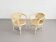 Pair of rattan and cane armchairs