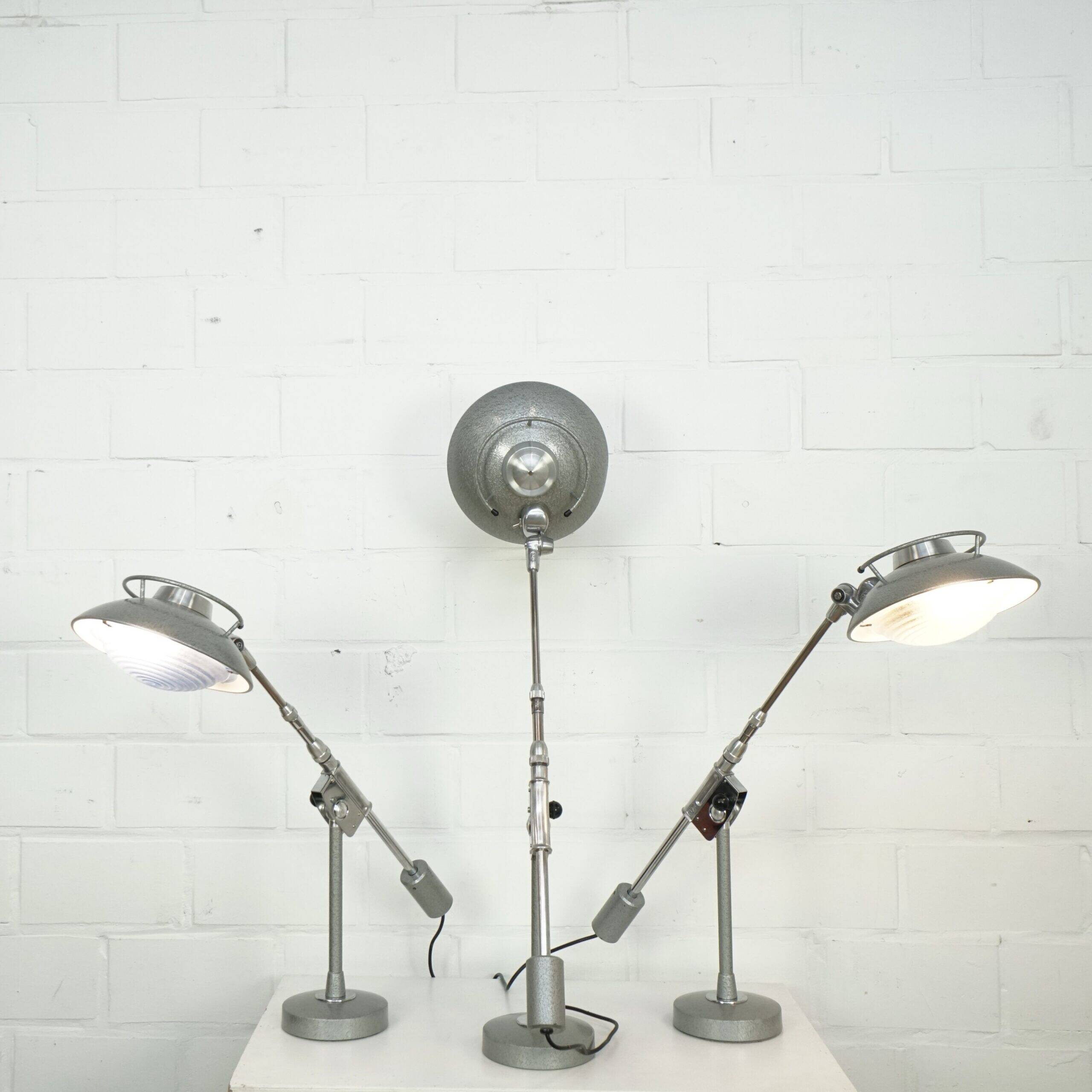 Fully adjustable Ferdinand Solere desk lamps