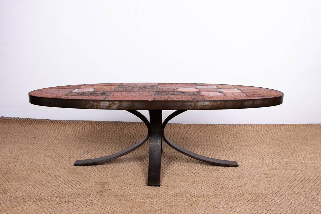 Lava stone, ceramic and steel coffee table by Jean Jaffeux 1960.