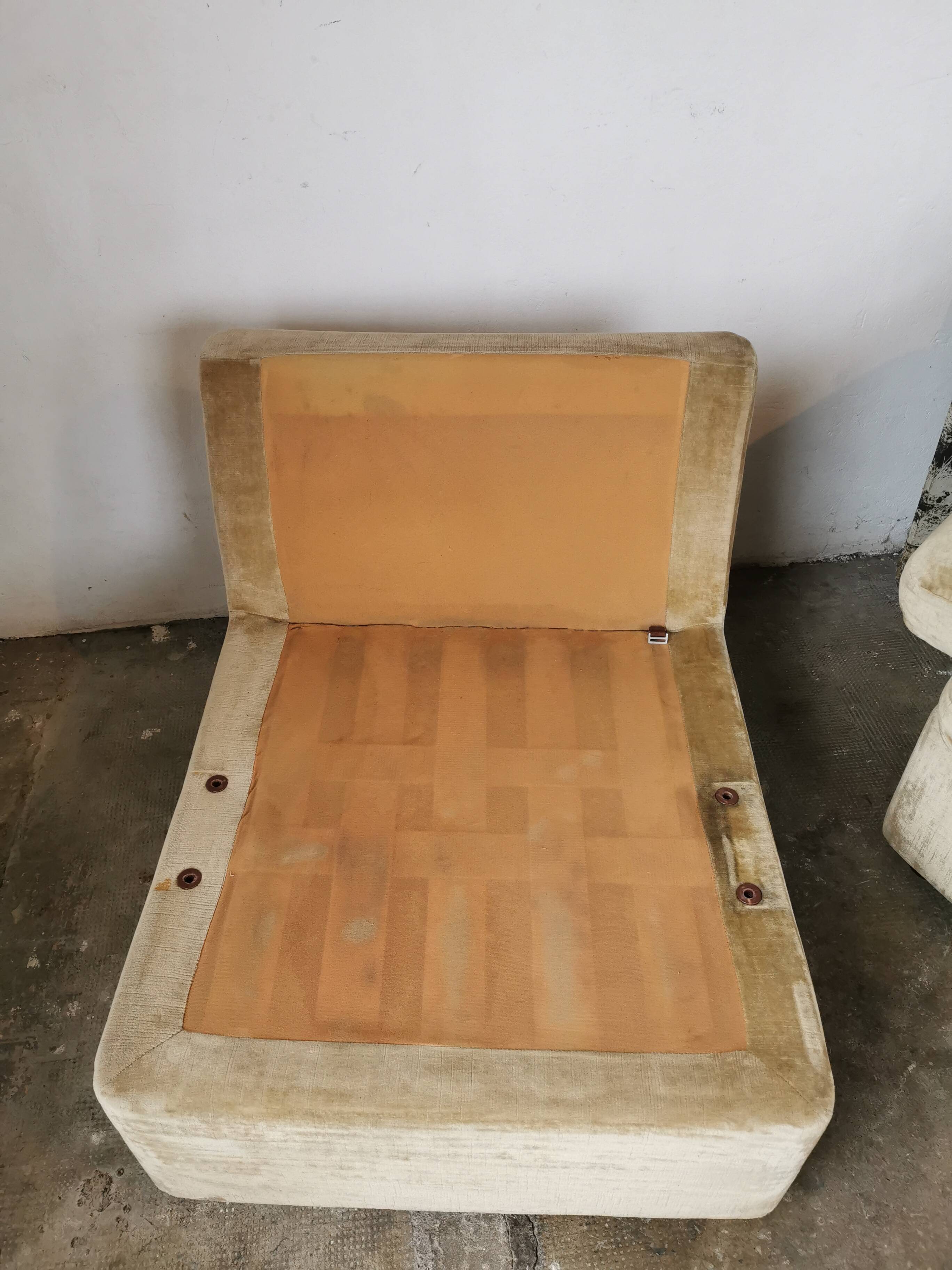 Pair of modular velvet armchairs and ottoman