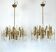 Sciolari, pair of Italian brass and glass chandeliers from 70s