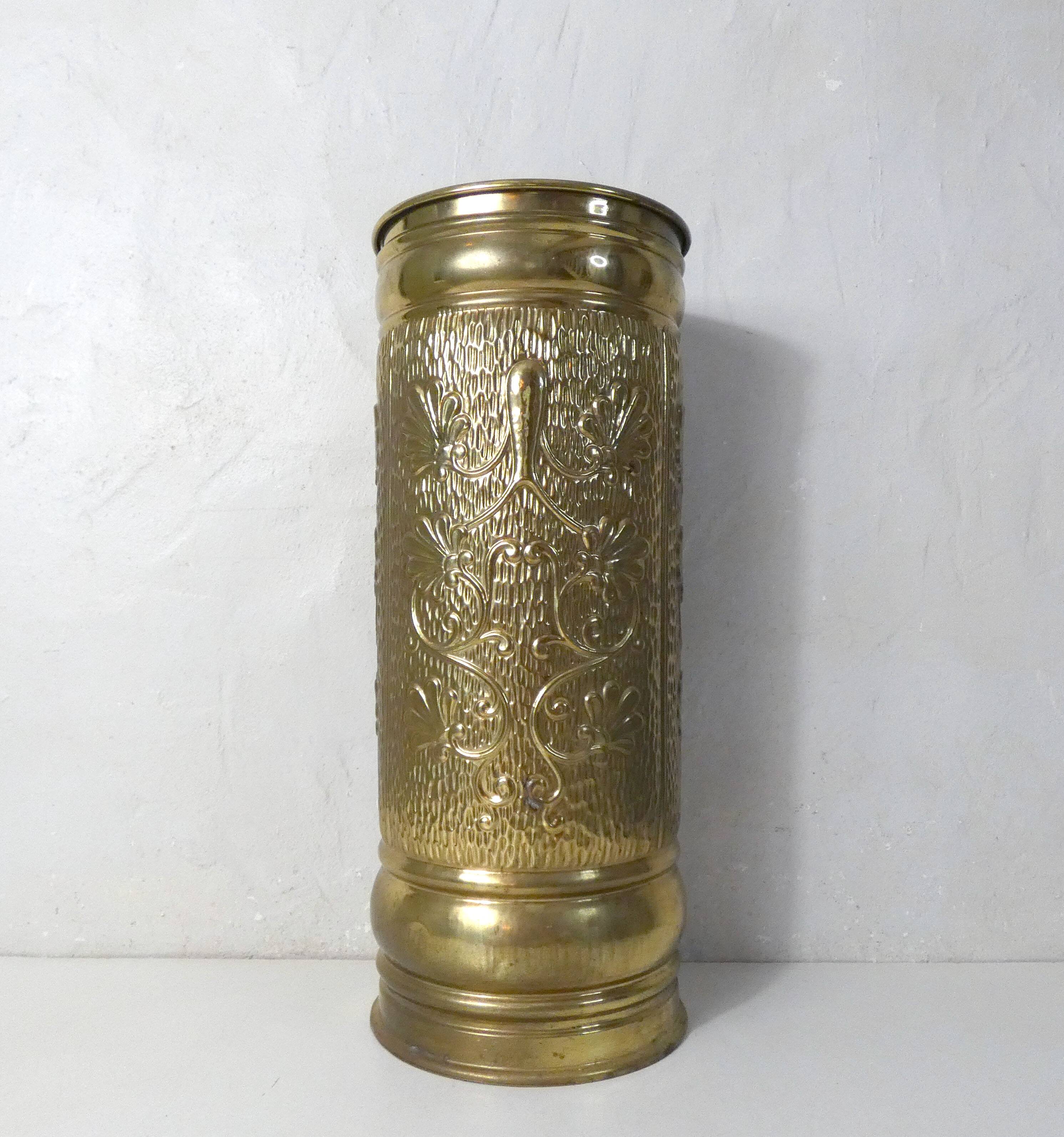 Old brass umbrella stand