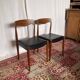 Pair of vintage teak chairs with black faux leather – Scandinavian style