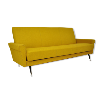 Yellow sofa bed on metal legs, 1970s