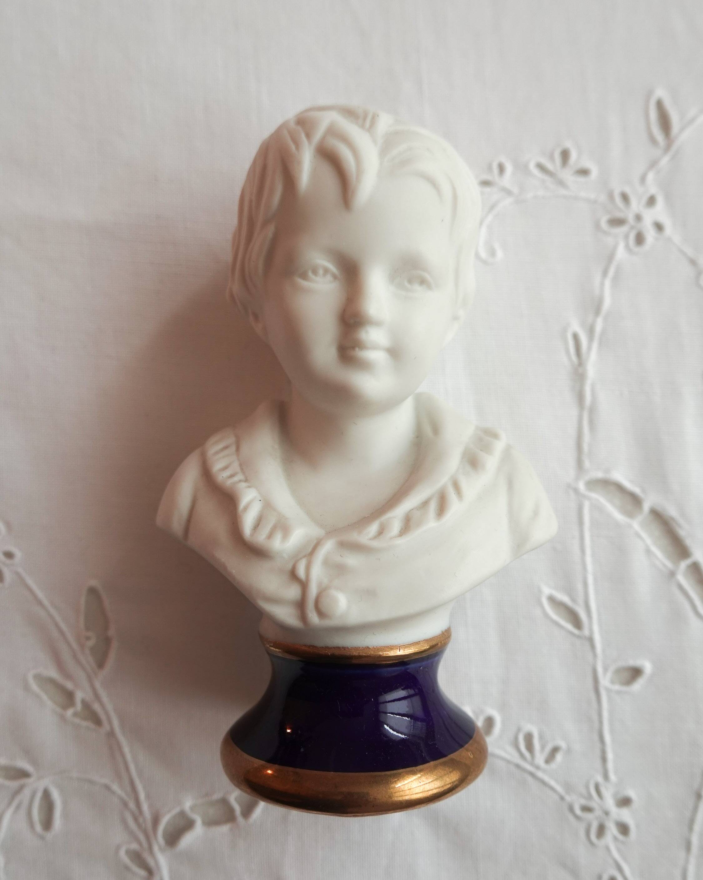 Pair of children's busts
