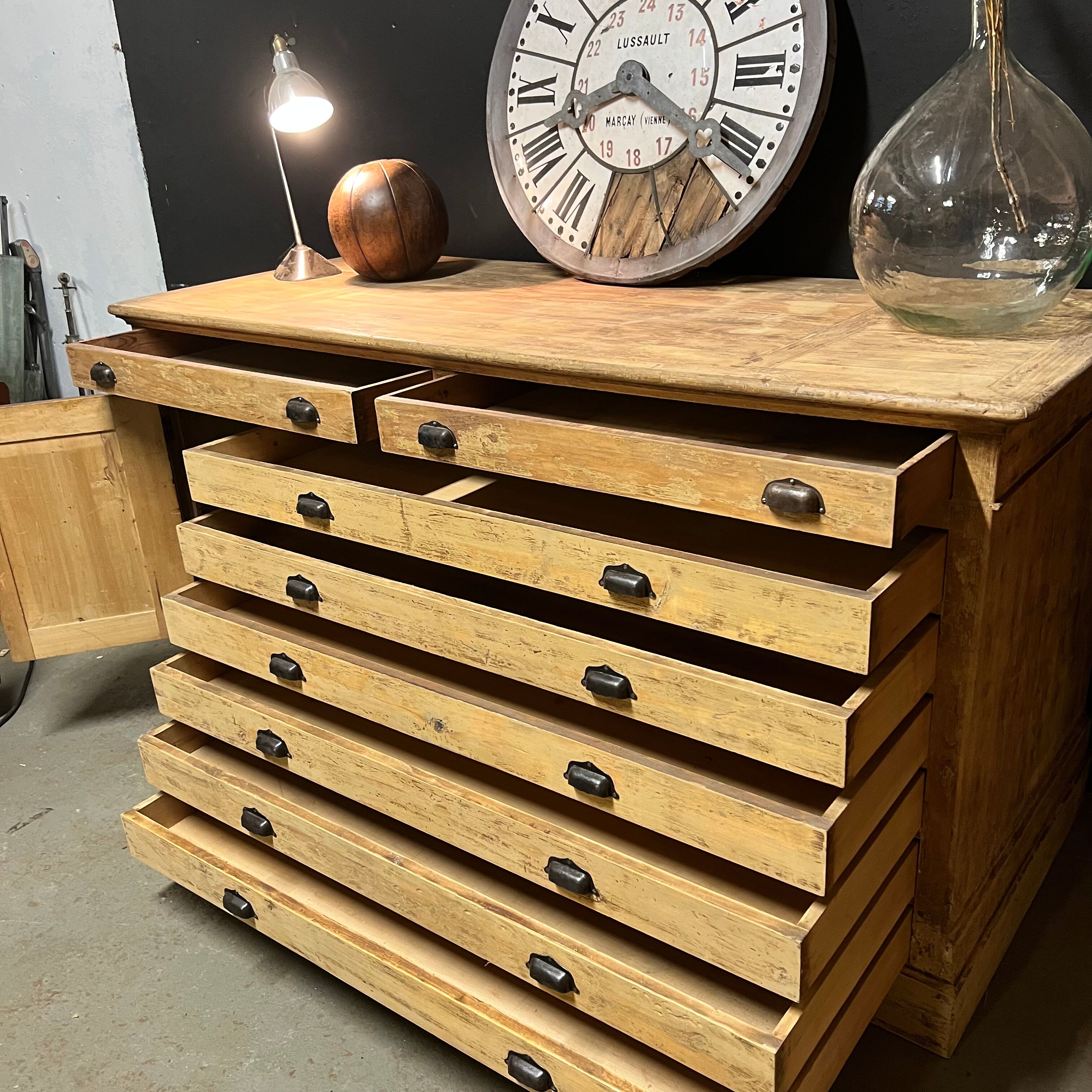 Old piece of furniture by trade with an architect's plan