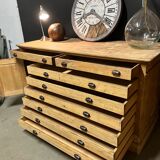 Old piece of furniture by trade with an architect's plan