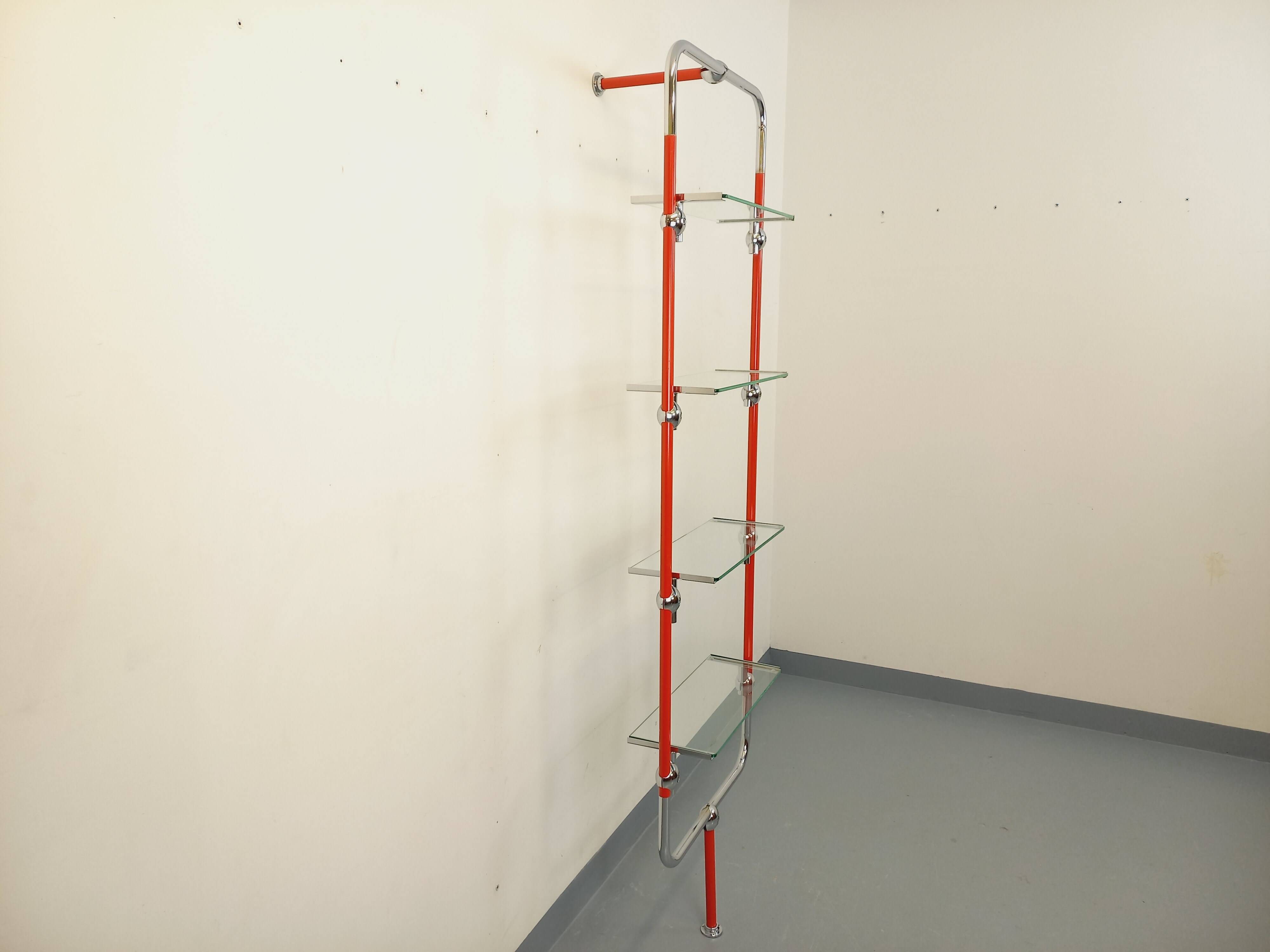 Modular bookshelf in vintage Bauhaus style, red metal, chrome.