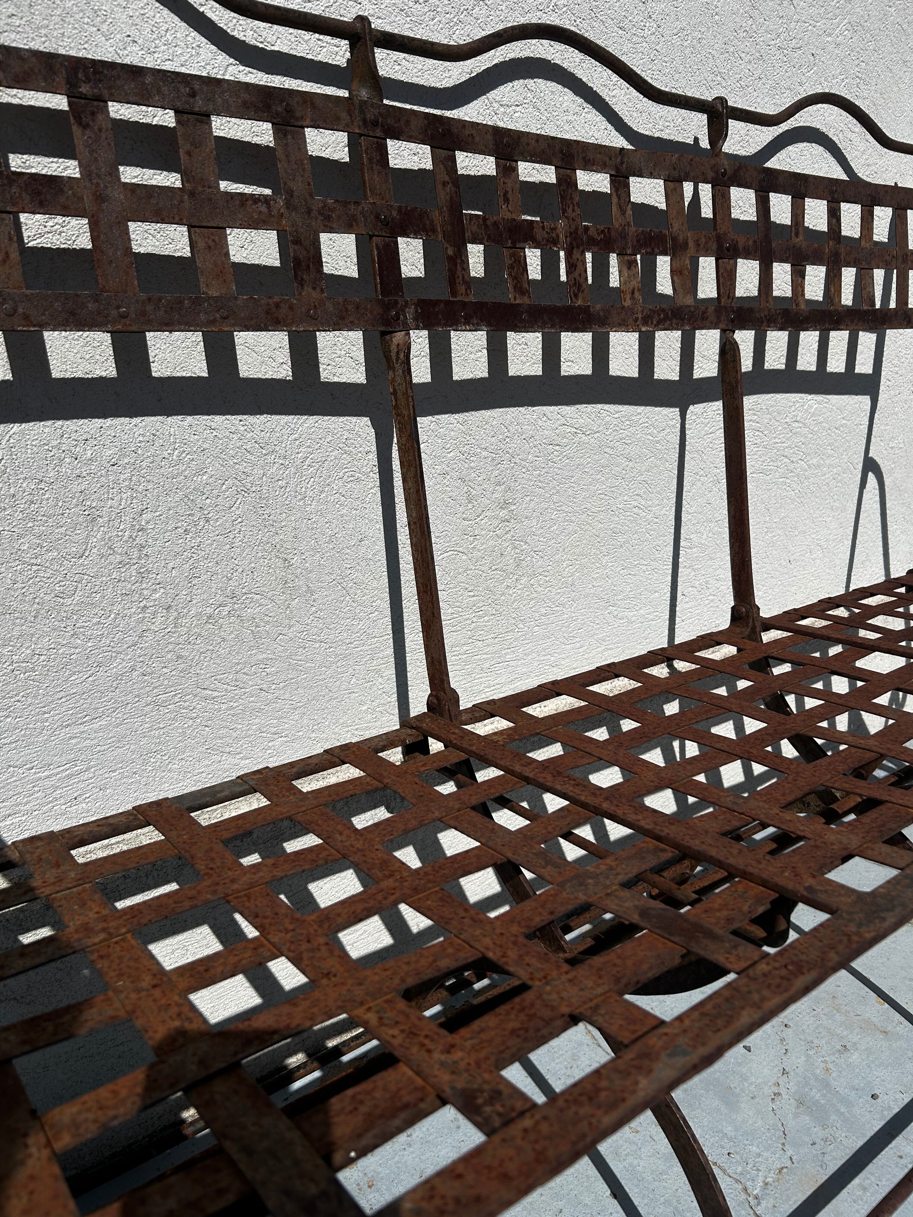Riveted wrought iron garden bench