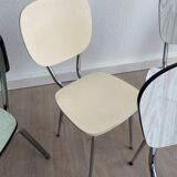 10 mismatched multicolored Formica chairs 60s