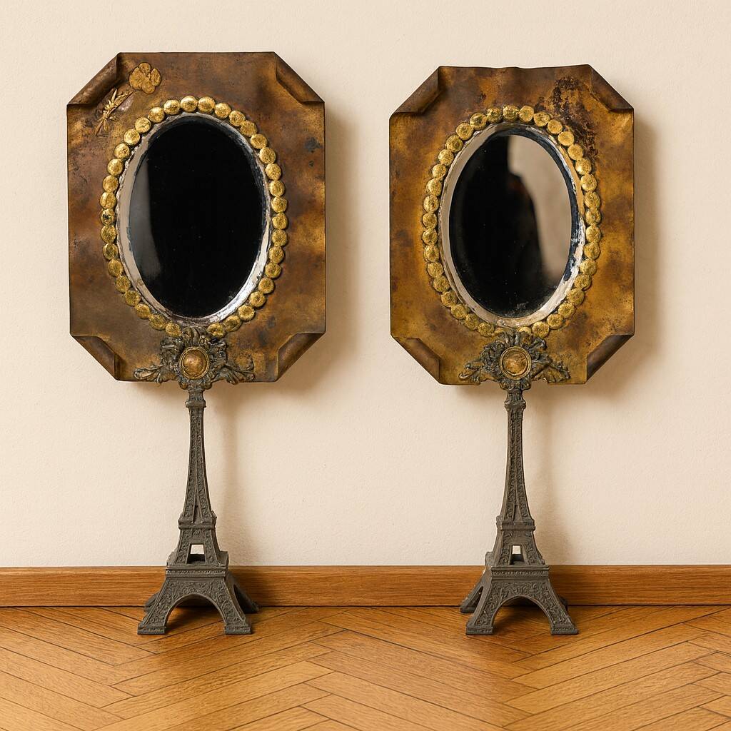 Pair of brass mirrors from the Art Deco period perched on the Eiffel Tower.
