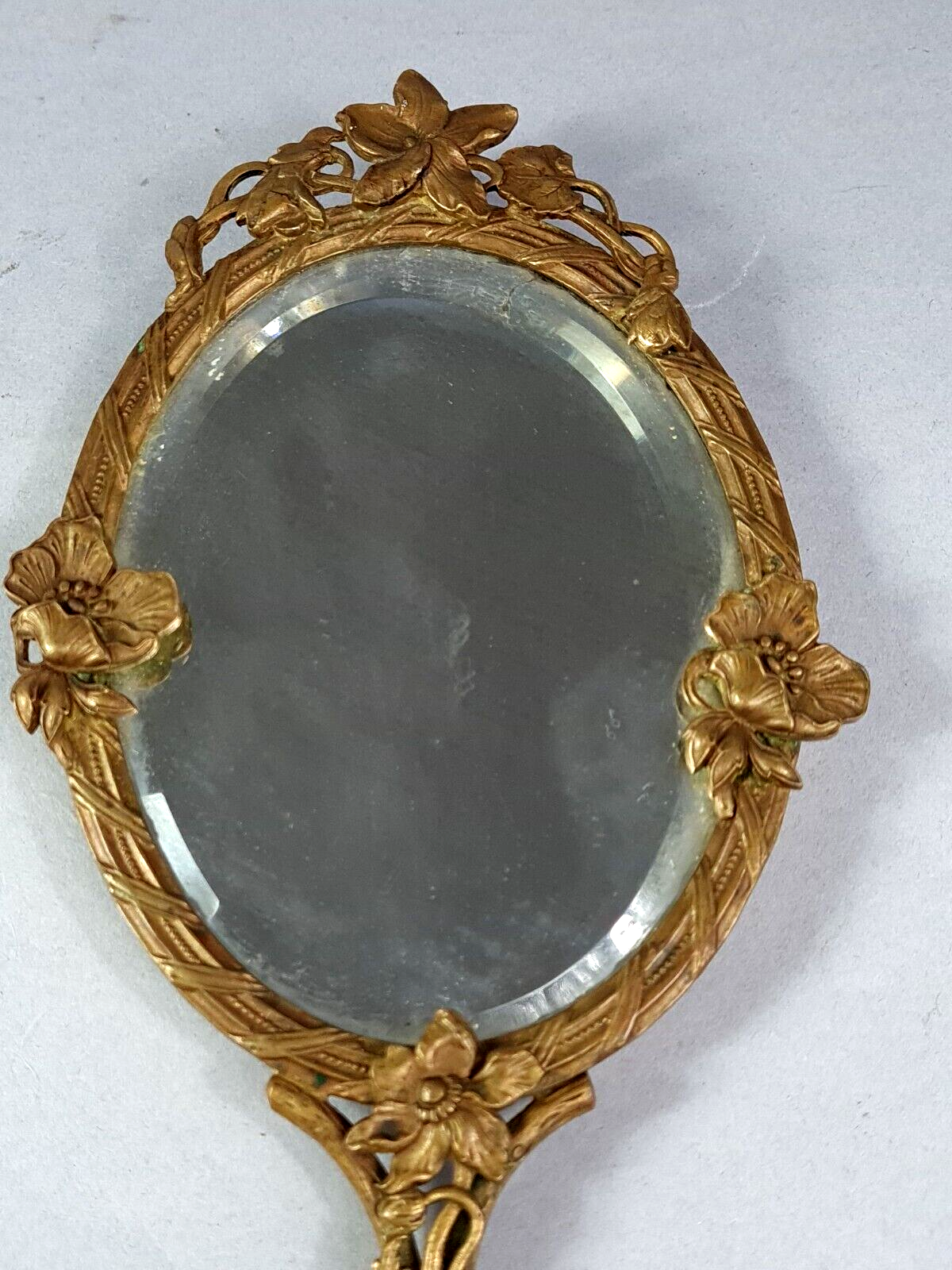 Miroir biseauté face à main ou à suspendre bronze vers 1900 SB152