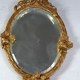 Miroir biseauté face à main ou à suspendre bronze vers 1900 SB152