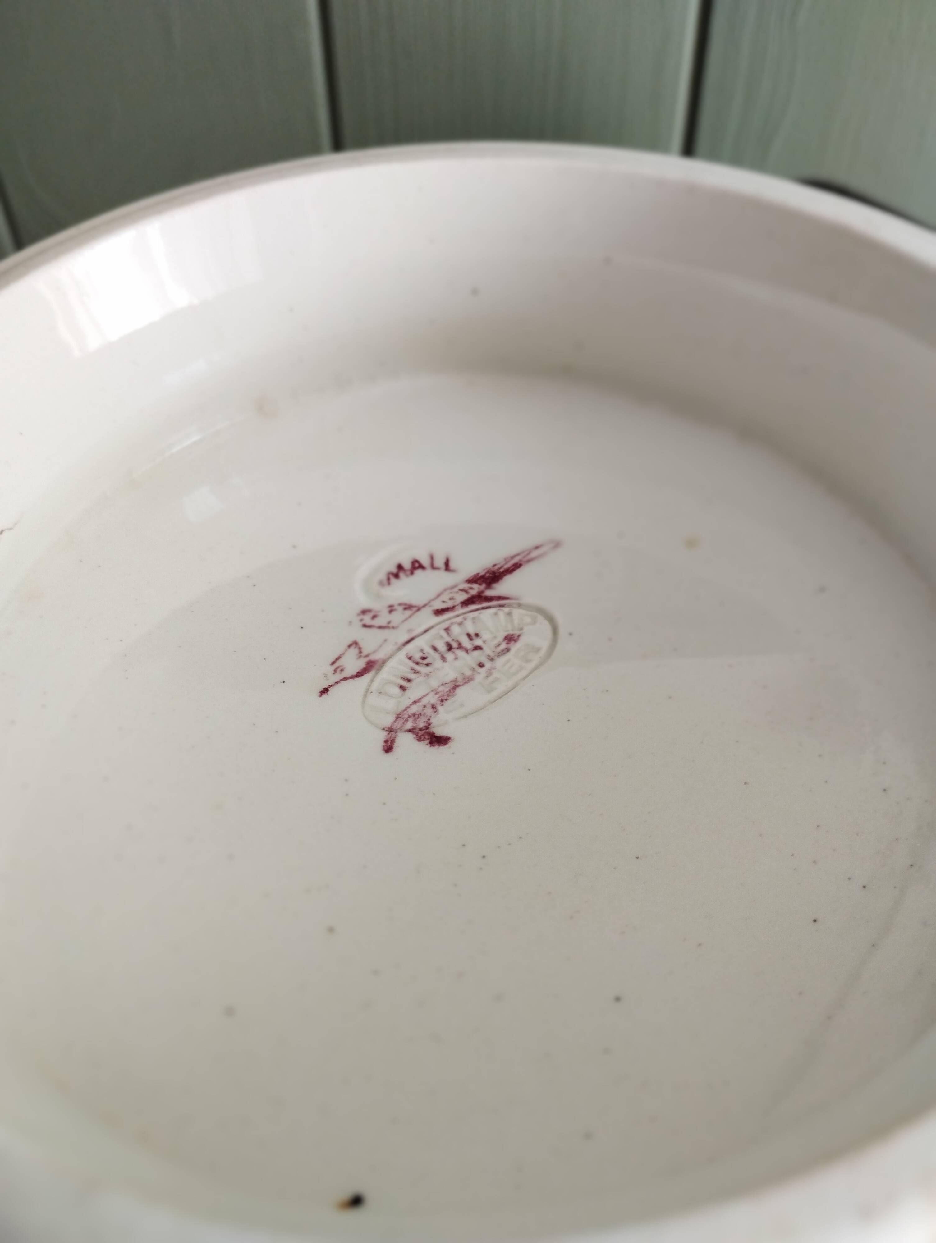 Iron earth plate Longchamp "Small Bird"