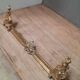 Barre de foyer en bronze doré