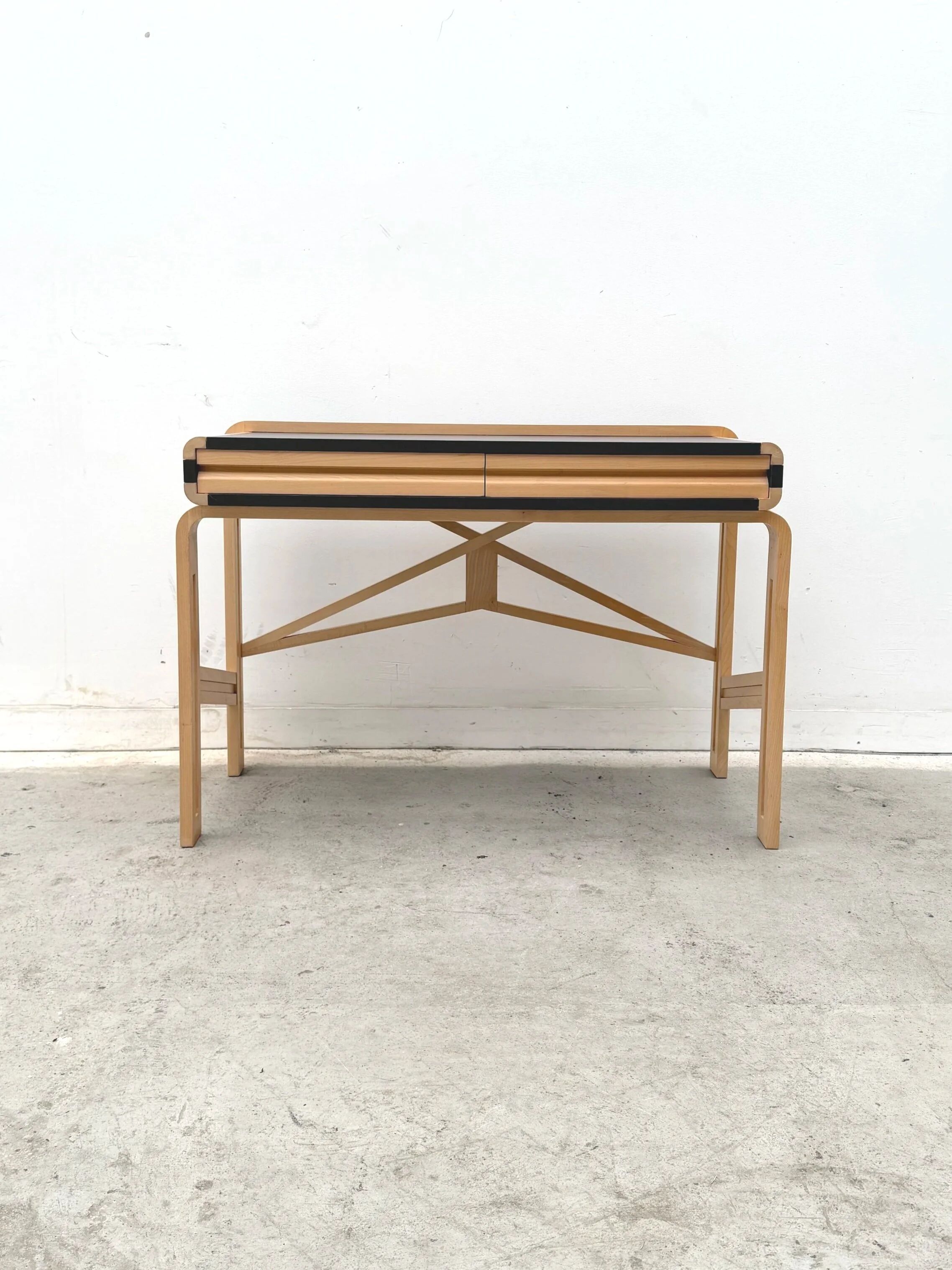 Solid wood and formica desk made by a cabinetmaker.
