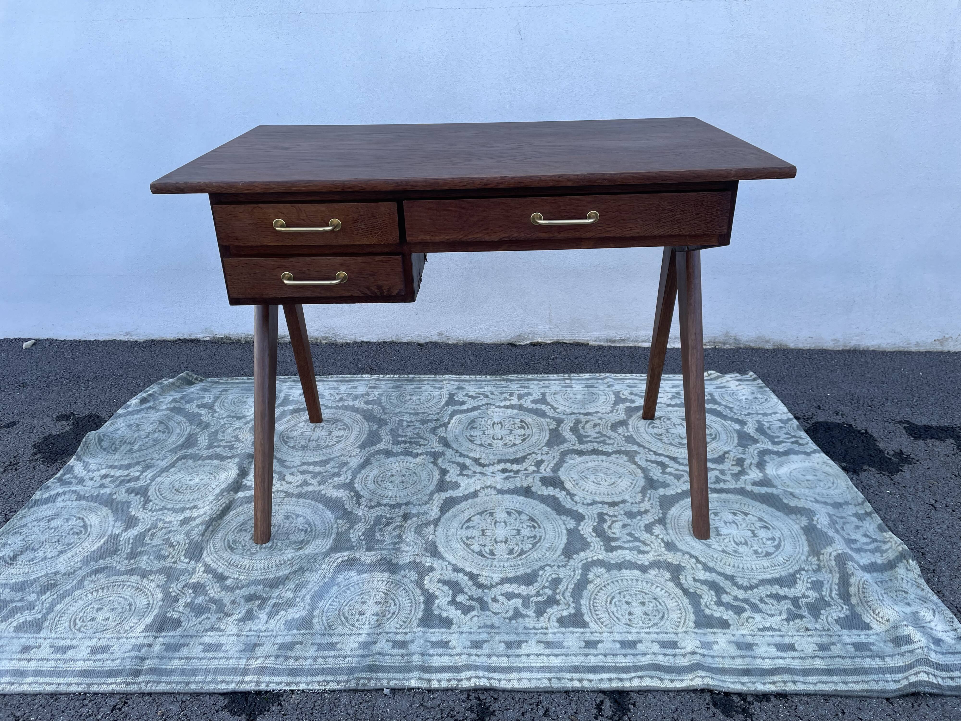 Modernist wooden desk with compass feet 1950