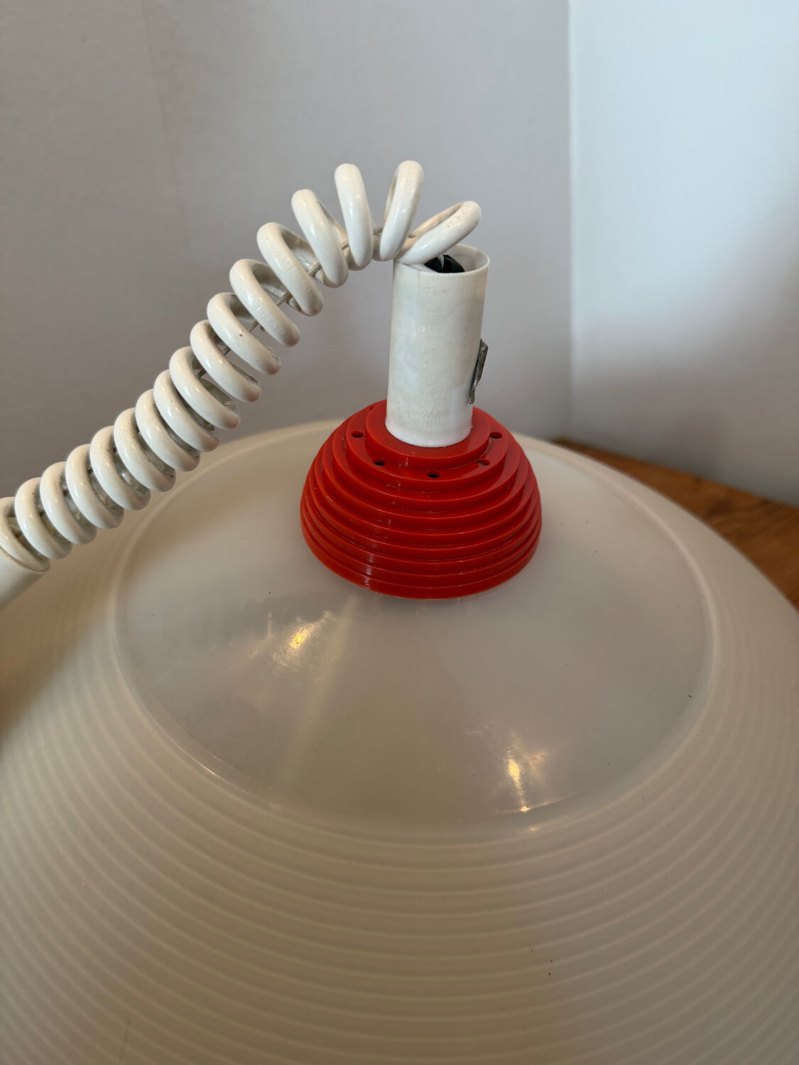 Suspension design Memphis red and white vintage model from the 80s.