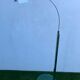 Chromed metal and glass floor lamp designed by Fontana Arte, Falena model by Alvaro Siza, 1990