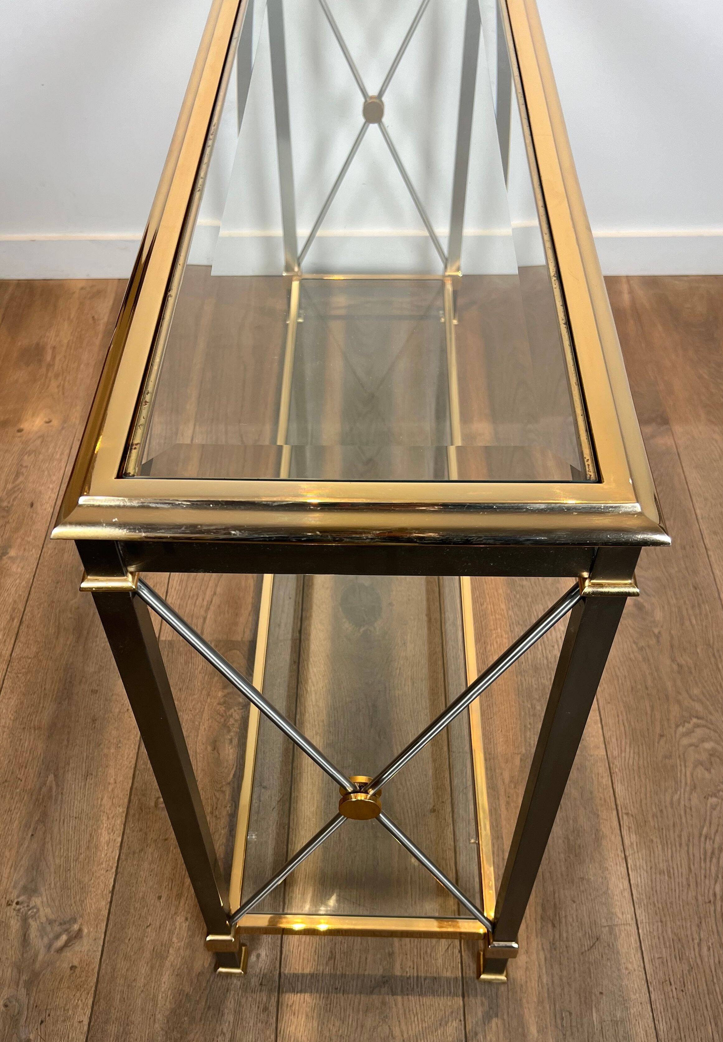 Console de style néoclassique en laiton doré et patine canon de fusil attribuée à la Maison Jansen