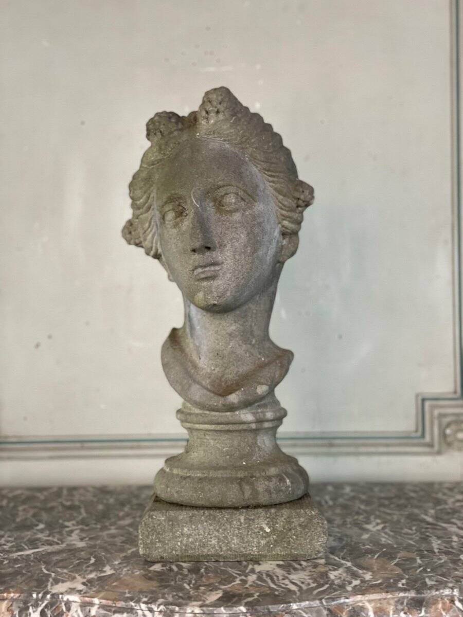 Female bust sculpted in stone